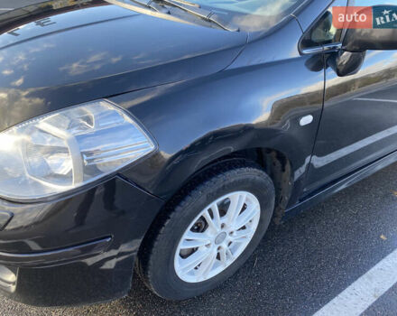 Черный Ниссан Тиида, объемом двигателя 1.6 л и пробегом 138 тыс. км за 7700 $, фото 13 на Automoto.ua