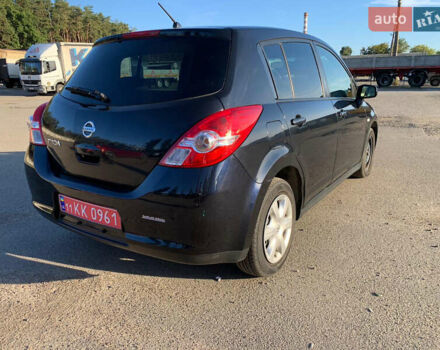 Черный Ниссан Тиида, объемом двигателя 1.5 л и пробегом 119 тыс. км за 7600 $, фото 4 на Automoto.ua