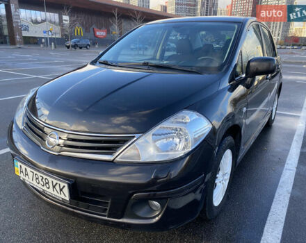 Черный Ниссан Тиида, объемом двигателя 1.6 л и пробегом 138 тыс. км за 7700 $, фото 1 на Automoto.ua