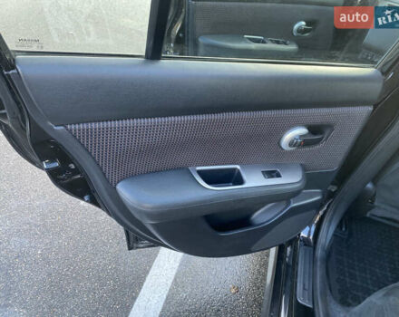 Черный Ниссан Тиида, объемом двигателя 1.6 л и пробегом 138 тыс. км за 7700 $, фото 23 на Automoto.ua