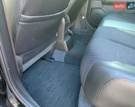 Черный Ниссан Тиида, объемом двигателя 1.5 л и пробегом 119 тыс. км за 7600 $, фото 12 на Automoto.ua