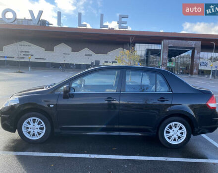 Черный Ниссан Тиида, объемом двигателя 1.6 л и пробегом 138 тыс. км за 7700 $, фото 11 на Automoto.ua