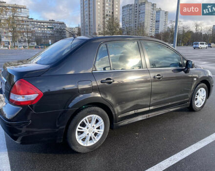Черный Ниссан Тиида, объемом двигателя 1.6 л и пробегом 138 тыс. км за 7700 $, фото 6 на Automoto.ua