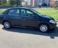 Черный Ниссан Тиида, объемом двигателя 1.6 л и пробегом 136 тыс. км за 10500 $, фото 2 на Automoto.ua