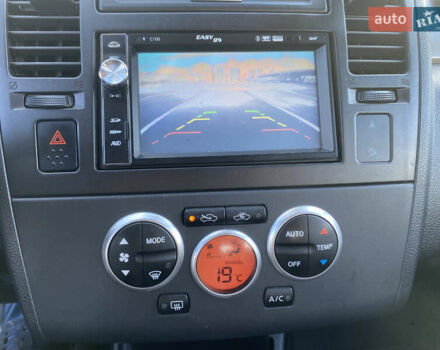 Черный Ниссан Тиида, объемом двигателя 1.6 л и пробегом 138 тыс. км за 7700 $, фото 18 на Automoto.ua