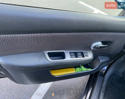 Черный Ниссан Тиида, объемом двигателя 1.6 л и пробегом 138 тыс. км за 7700 $, фото 22 на Automoto.ua