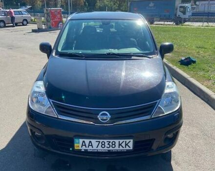 Черный Ниссан Тиида, объемом двигателя 1.6 л и пробегом 136 тыс. км за 10500 $, фото 1 на Automoto.ua
