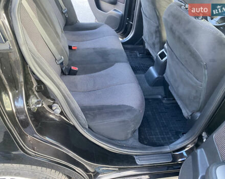 Черный Ниссан Тиида, объемом двигателя 1.6 л и пробегом 138 тыс. км за 7700 $, фото 25 на Automoto.ua