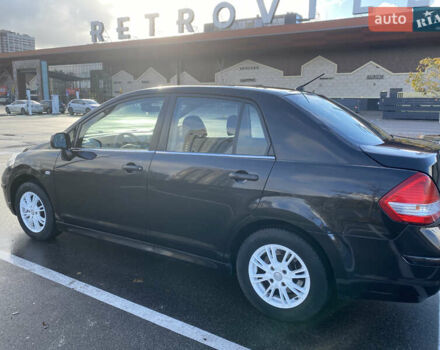 Черный Ниссан Тиида, объемом двигателя 1.6 л и пробегом 138 тыс. км за 7700 $, фото 10 на Automoto.ua