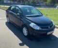 Черный Ниссан Тиида, объемом двигателя 1.6 л и пробегом 136 тыс. км за 10500 $, фото 1 на Automoto.ua