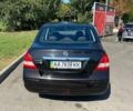 Черный Ниссан Тиида, объемом двигателя 1.6 л и пробегом 136 тыс. км за 10500 $, фото 4 на Automoto.ua
