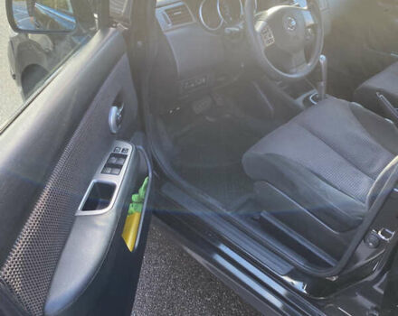 Черный Ниссан Тиида, объемом двигателя 1.6 л и пробегом 138 тыс. км за 7700 $, фото 16 на Automoto.ua