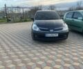 Черный Ниссан Тиида, объемом двигателя 1.6 л и пробегом 282 тыс. км за 5500 $, фото 2 на Automoto.ua