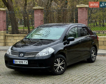 Черный Ниссан Тиида, объемом двигателя 1.6 л и пробегом 132 тыс. км за 4850 $, фото 1 на Automoto.ua