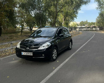 Черный Ниссан Тиида, объемом двигателя 1.6 л и пробегом 270 тыс. км за 4500 $, фото 1 на Automoto.ua