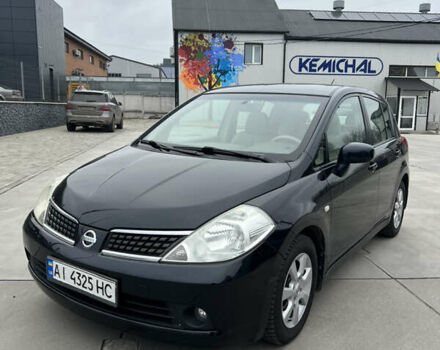 Черный Ниссан Тиида, объемом двигателя 1.6 л и пробегом 188 тыс. км за 5800 $, фото 1 на Automoto.ua