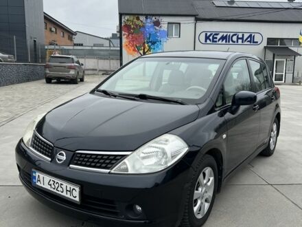 Черный Ниссан Тиида, объемом двигателя 1.6 л и пробегом 188 тыс. км за 5800 $, фото 1 на Automoto.ua