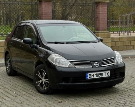 Черный Ниссан Тиида, объемом двигателя 1.6 л и пробегом 130 тыс. км за 4850 $, фото 1 на Automoto.ua