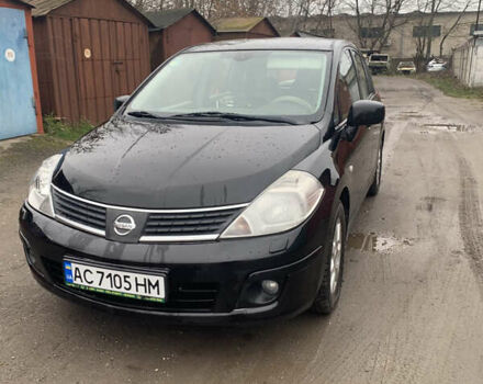 Черный Ниссан Тиида, объемом двигателя 1.46 л и пробегом 261 тыс. км за 5400 $, фото 1 на Automoto.ua