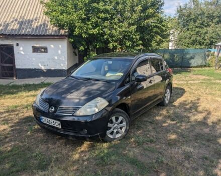 Черный Ниссан Тиида, объемом двигателя 1.6 л и пробегом 209 тыс. км за 4400 $, фото 1 на Automoto.ua