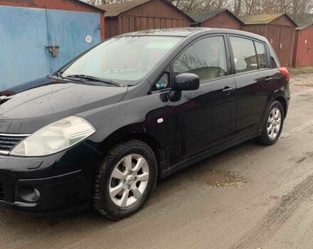 Черный Ниссан Тиида, объемом двигателя 1.5 л и пробегом 261 тыс. км за 5500 $, фото 1 на Automoto.ua