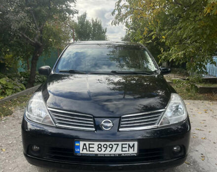 Черный Ниссан Тиида, объемом двигателя 1.6 л и пробегом 304 тыс. км за 4600 $, фото 1 на Automoto.ua