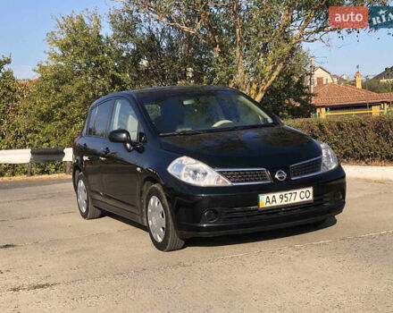 Черный Ниссан Тиида, объемом двигателя 1.6 л и пробегом 257 тыс. км за 5600 $, фото 1 на Automoto.ua