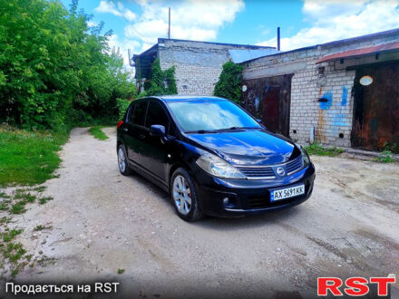 Черный Ниссан Тиида, объемом двигателя 1.8 л и пробегом 246 тыс. км за 3500 $, фото 1 на Automoto.ua