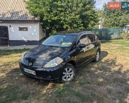 Черный Ниссан Тиида, объемом двигателя 1.6 л и пробегом 209 тыс. км за 4400 $, фото 1 на Automoto.ua