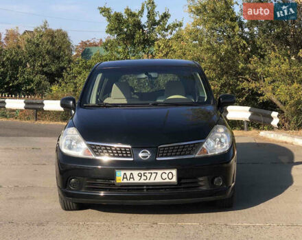 Черный Ниссан Тиида, объемом двигателя 1.6 л и пробегом 257 тыс. км за 5800 $, фото 1 на Automoto.ua
