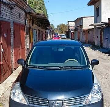 Черный Ниссан Тиида, объемом двигателя 1.6 л и пробегом 210 тыс. км за 3900 $, фото 1 на Automoto.ua