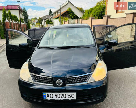Черный Ниссан Тиида, объемом двигателя 1.6 л и пробегом 187 тыс. км за 5800 $, фото 1 на Automoto.ua