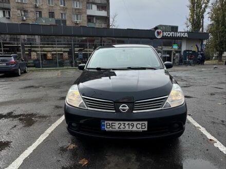 Черный Ниссан Тиида, объемом двигателя 1.6 л и пробегом 222 тыс. км за 5900 $, фото 1 на Automoto.ua