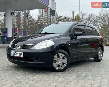 Черный Ниссан Тиида, объемом двигателя 1.6 л и пробегом 172 тыс. км за 6900 $, фото 1 на Automoto.ua