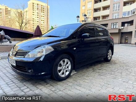 Черный Ниссан Тиида, объемом двигателя 1.6 л и пробегом 282 тыс. км за 4950 $, фото 1 на Automoto.ua