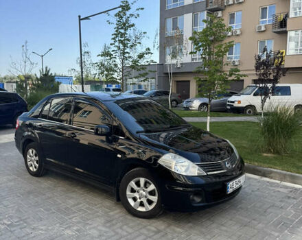 Черный Ниссан Тиида, объемом двигателя 1.6 л и пробегом 165 тыс. км за 7000 $, фото 1 на Automoto.ua