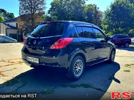 Черный Ниссан Тиида, объемом двигателя 1.6 л и пробегом 155 тыс. км за 6500 $, фото 1 на Automoto.ua