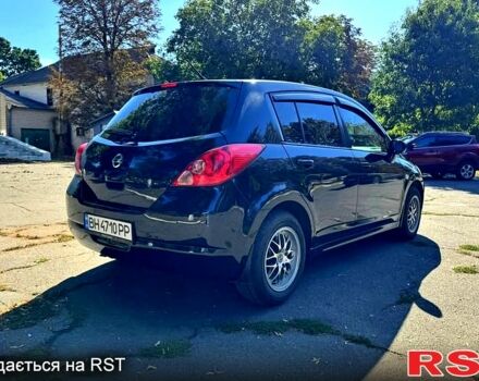 Черный Ниссан Тиида, объемом двигателя 1.6 л и пробегом 155 тыс. км за 6500 $, фото 1 на Automoto.ua