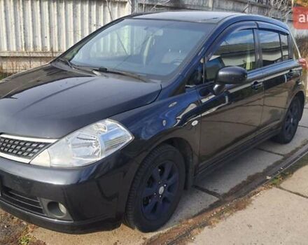 Черный Ниссан Тиида, объемом двигателя 1.6 л и пробегом 229 тыс. км за 5900 $, фото 1 на Automoto.ua