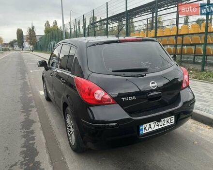 Черный Ниссан Тиида, объемом двигателя 1.6 л и пробегом 129 тыс. км за 5500 $, фото 1 на Automoto.ua