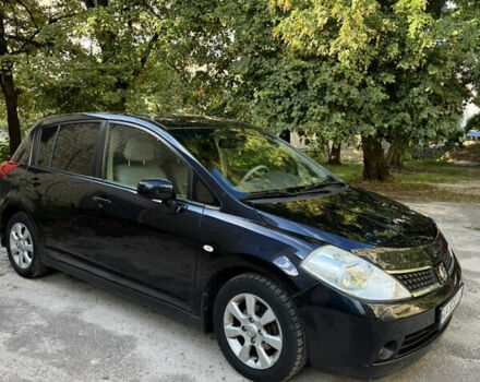 Черный Ниссан Тиида, объемом двигателя 1.6 л и пробегом 227 тыс. км за 5700 $, фото 1 на Automoto.ua