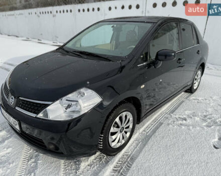 Черный Ниссан Тиида, объемом двигателя 1.6 л и пробегом 135 тыс. км за 6700 $, фото 1 на Automoto.ua