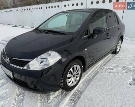 Черный Ниссан Тиида, объемом двигателя 1.6 л и пробегом 136 тыс. км за 6500 $, фото 1 на Automoto.ua