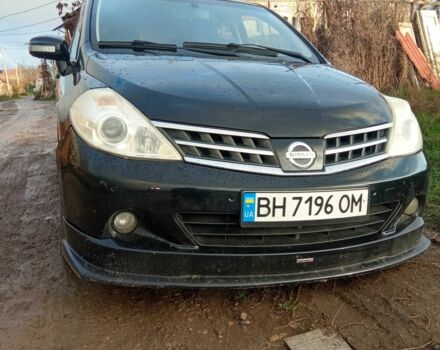 Черный Ниссан Тиида, объемом двигателя 1.5 л и пробегом 120 тыс. км за 6000 $, фото 1 на Automoto.ua