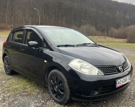 Черный Ниссан Тиида, объемом двигателя 1.6 л и пробегом 138 тыс. км за 6400 $, фото 1 на Automoto.ua