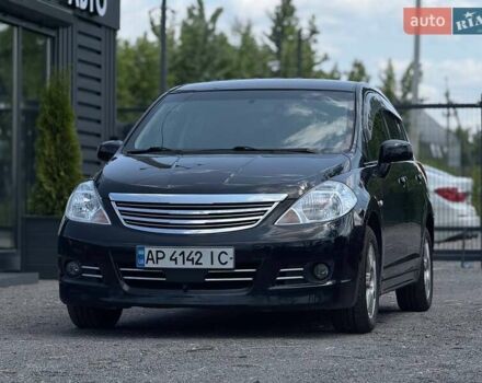 Черный Ниссан Тиида, объемом двигателя 1.49 л и пробегом 152 тыс. км за 8000 $, фото 1 на Automoto.ua