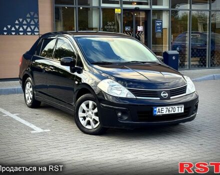 Черный Ниссан Тиида, объемом двигателя 1.6 л и пробегом 137 тыс. км за 5700 $, фото 1 на Automoto.ua