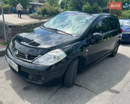 Черный Ниссан Тиида, объемом двигателя 1.6 л и пробегом 237 тыс. км за 6199 $, фото 1 на Automoto.ua