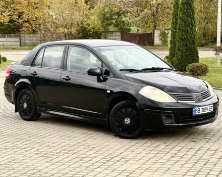 Черный Ниссан Тиида, объемом двигателя 1.6 л и пробегом 170 тыс. км за 4199 $, фото 1 на Automoto.ua