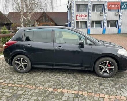 Черный Ниссан Тиида, объемом двигателя 1.5 л и пробегом 102 тыс. км за 7400 $, фото 1 на Automoto.ua